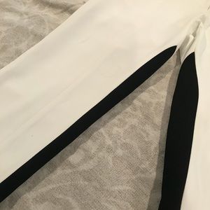 Sachin and Babi white pant with black inner leg